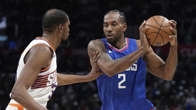 Clippers sign 2-time NBA Finals MVP Leonard to a 3-year extension worth $152.3 million per AP source