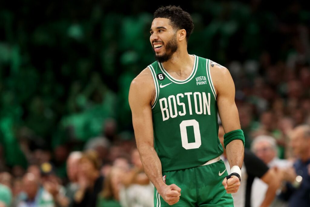 Jayson Tatum downplays his MVP expectations in favor of team success.